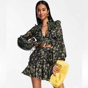ASOS DESIGN flippy top with rouleaux loop detail in floral print